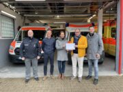 DRK-Ortsverein freut sich über Spende EVOBEAM > Nieder-Olmer Firma übergibt 1500 Euro für neuen Grillplatz