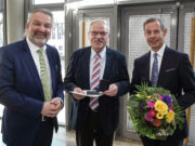 Wappen der Stadt Rüsselsheim am Main in Silber für Heinz E. Schneider