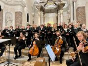 „Illuminare – ein Licht für Frieden in dunklen Zeiten“ Konzert >>>KAMEL gastierte mit dem Projektchor der Cäcilia 1936 in der katholischen Kirche